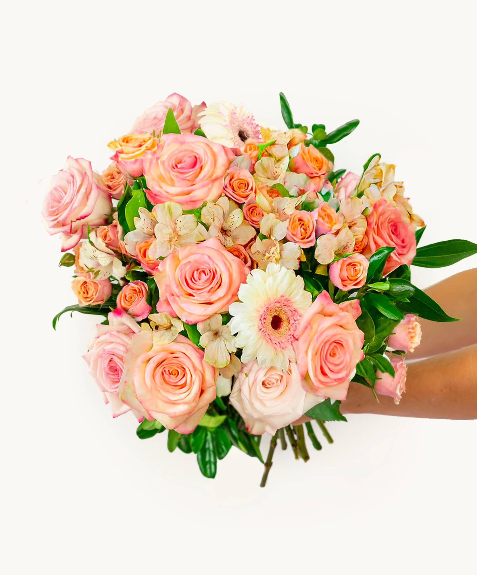 Vibrant bouquet of pink roses, daisies, and delicate flowers in a charming arrangement.